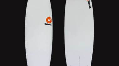 a man standing on a snow board