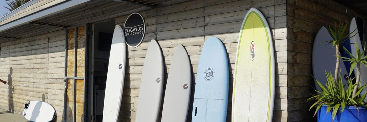 rentals-surf-principal-1 a row boat on the side of a building