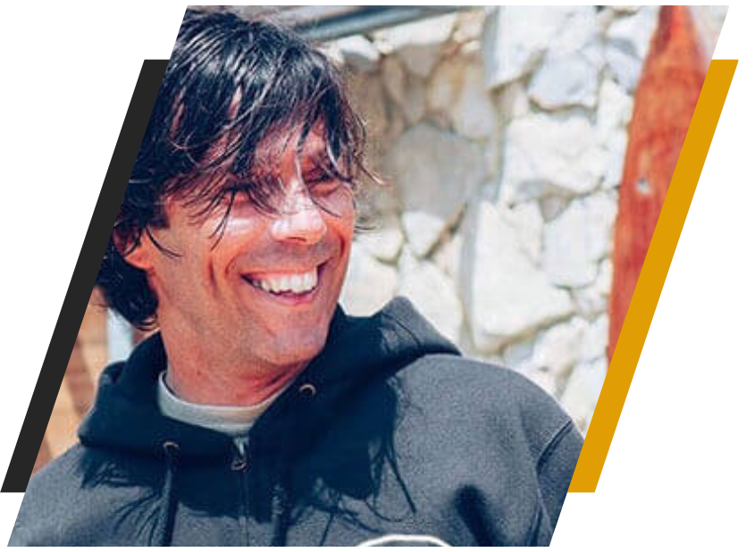 a man smiling for the camera