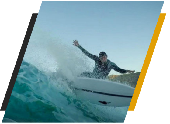 a man riding a wave on a surfboard in the water